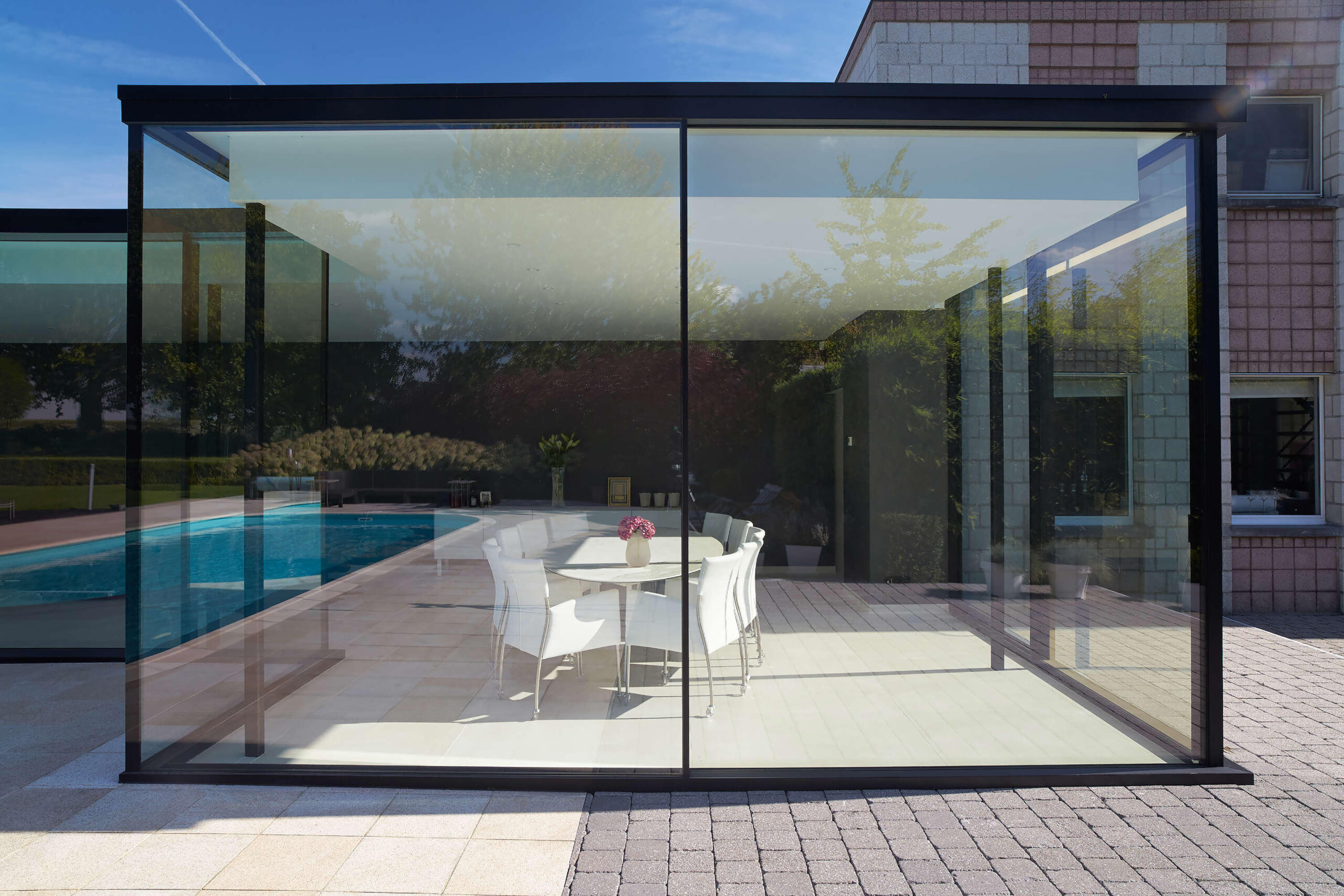 Modern summer cafe exterior with big glass doors